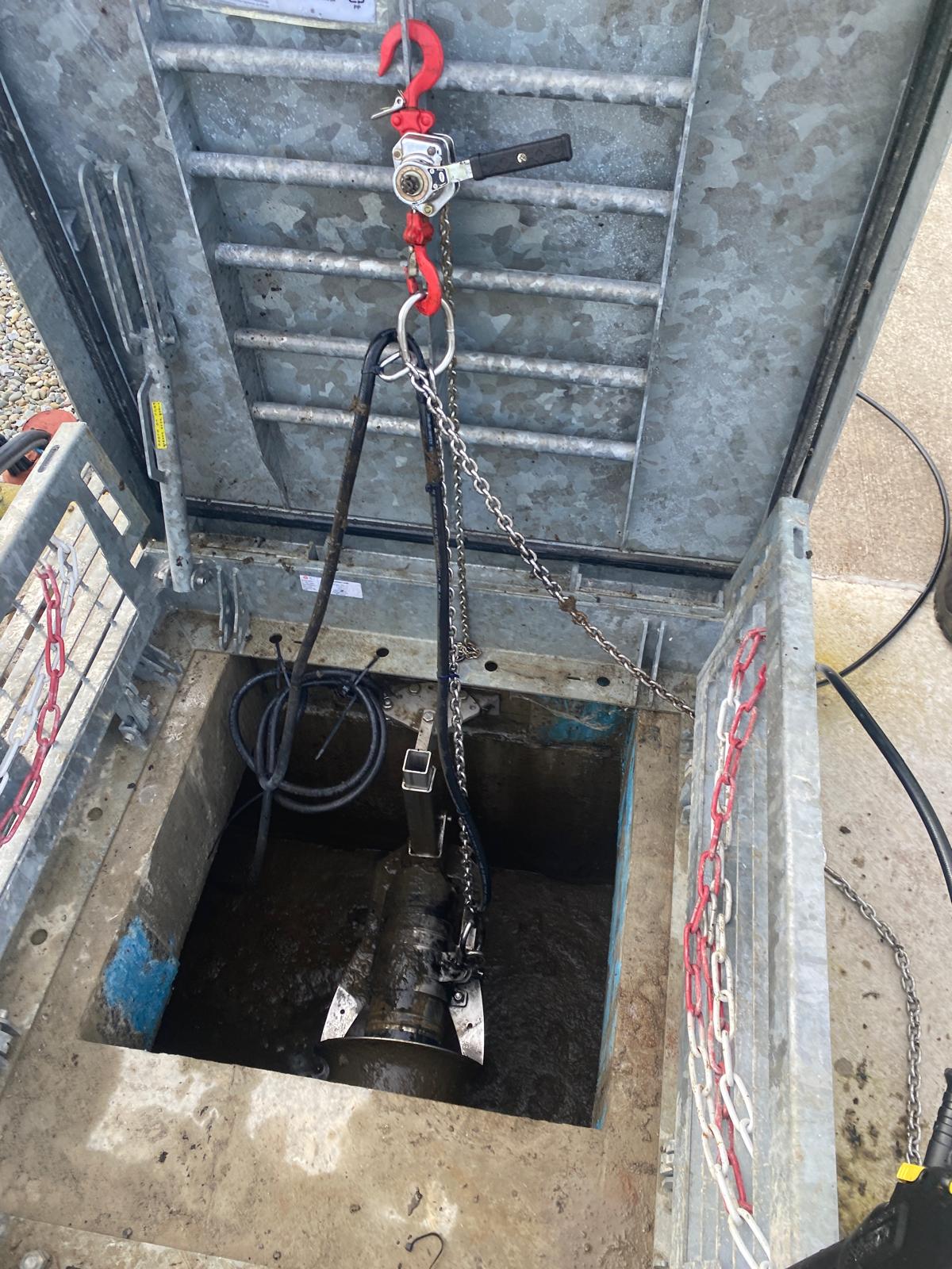 Chain hoist and lifting tackle over a confined access point during a GA1 inspection
